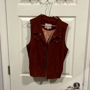 Dark orange vest